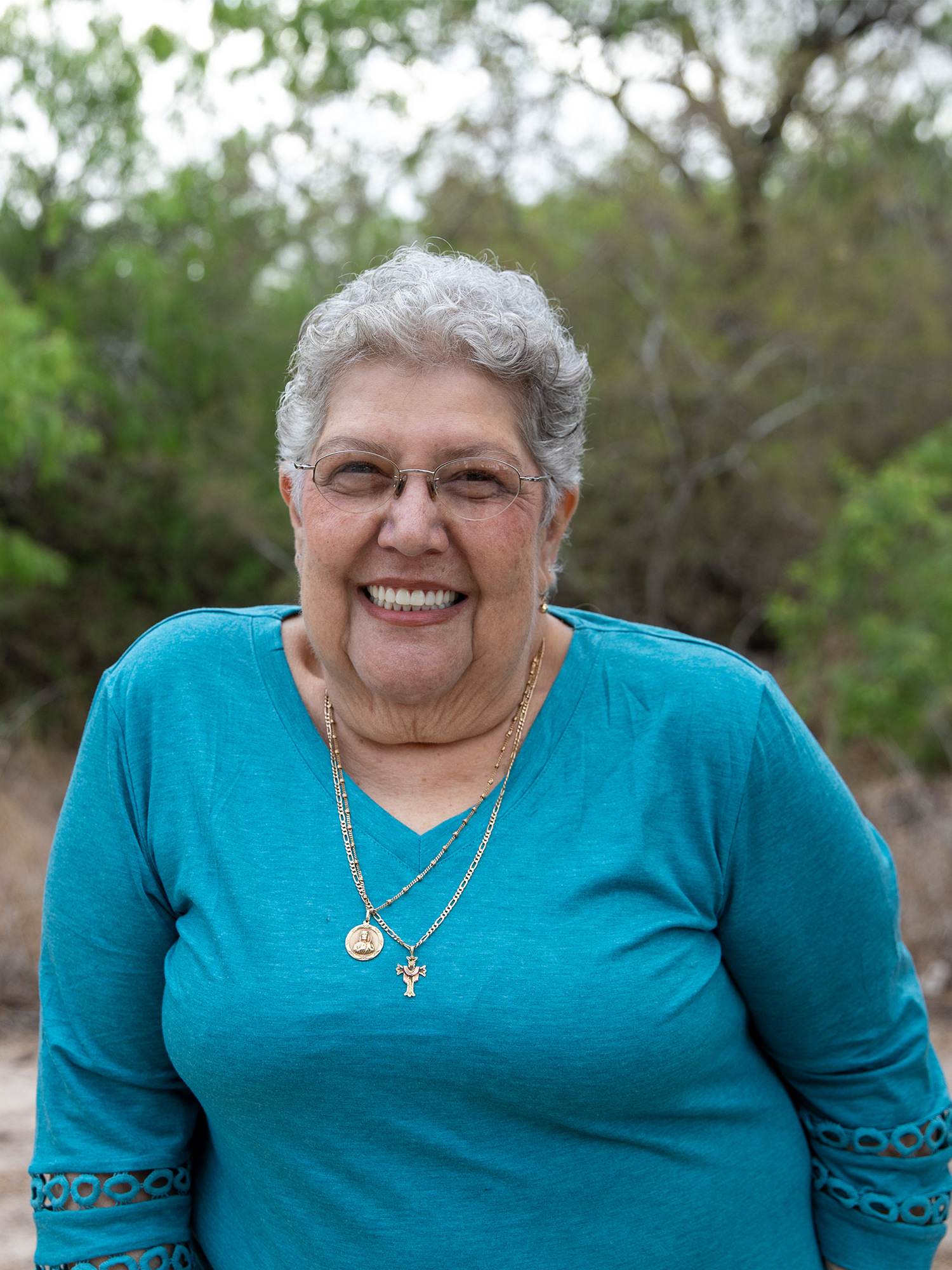 Full Arch patient smiling outside